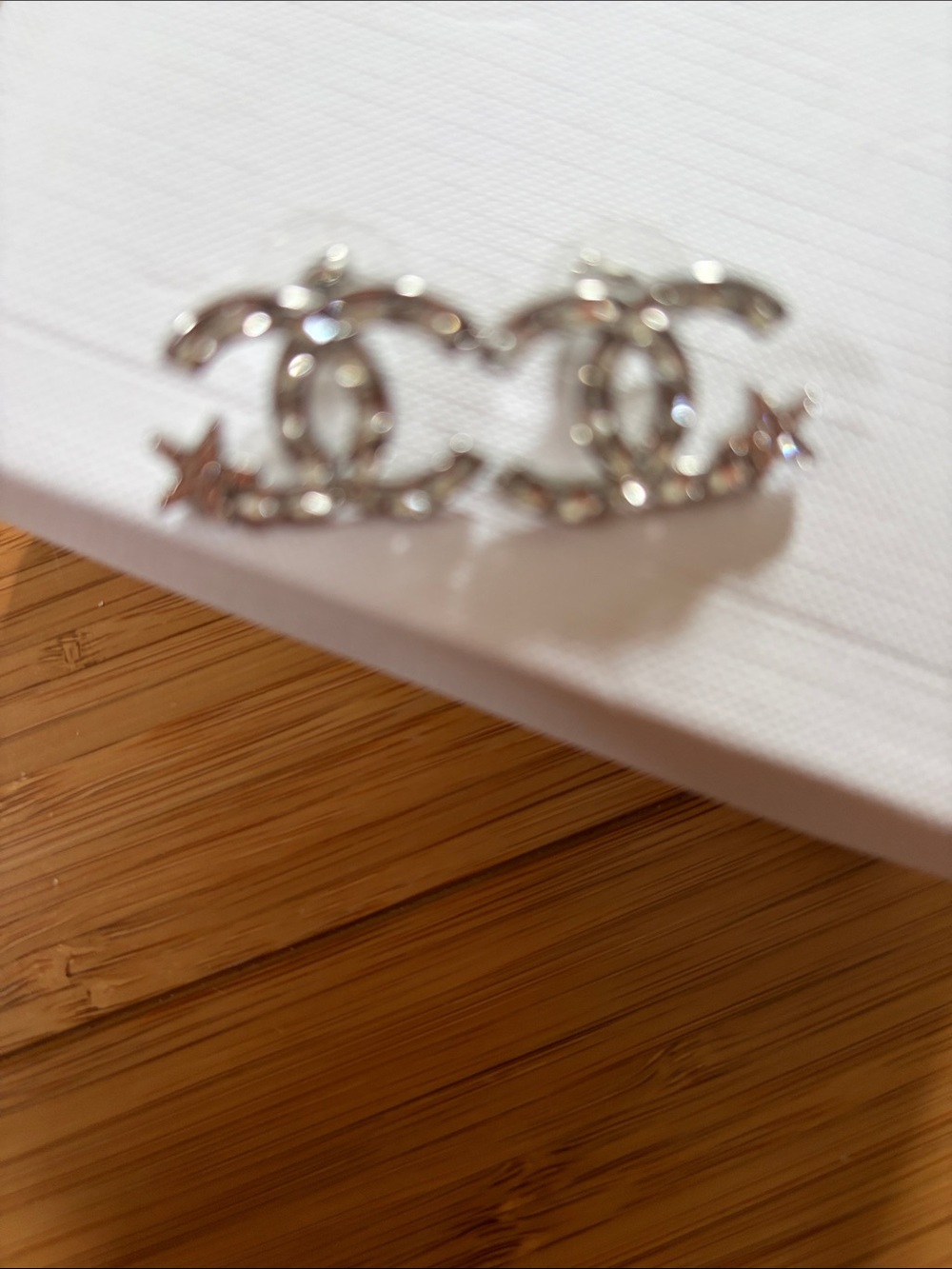 CHANEL Silver Interlocking CC Crystal Stud Earrings